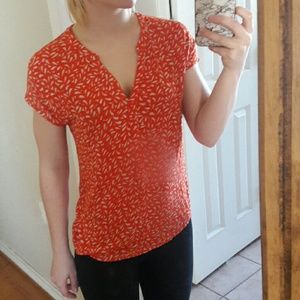 Orange and tan print top